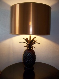 A copper shaded lamp